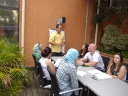 Conversation on a quiet terrace in a cosy morning setting