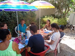 Students from different countries, enjoying a coffee-break in the garden