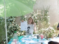 A proud student from Santiago de Chile shows her diploma after a long stay at our school