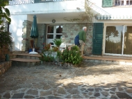 The entrance from the secured Gate with the terrace for your evening meals