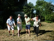 Four brothers pretending to play pétanque!